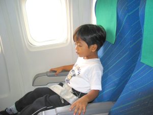 child on airplane Expressive Mom